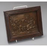 A bronze putti plaque overall 16 x 20cm
