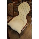 A Victorian walnut spoonback chair
