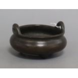 A Chinese bronze tripod censer height 6.5cm