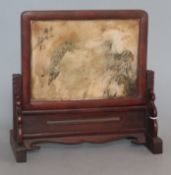 A Chinese dreamstone marble and hardwood table screen height 23cm