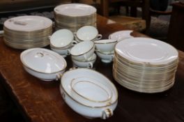 An extensive service of Copeland dinner ware, crested and gilt-bordered