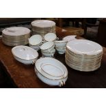 An extensive service of Copeland dinner ware, crested and gilt-bordered