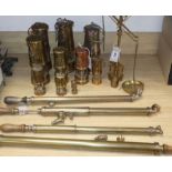 Ten reproduction and miniature brass Davy lamps, four brass garden sprayers and a set of brass