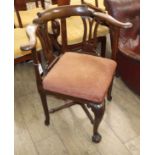 A George II mahogany corner elbow chair