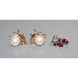 Two pairs of earrings including 14k and cultured pearl and 18ct gold and gem set.