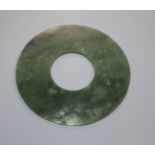 A Chinese spinach green jade bi disc 15.4cm