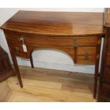 A Regency mahogany bow-fronted dressing table fitted three drawers W.87cm