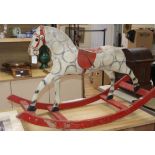 A vintage Stred rocking horse length 107cm