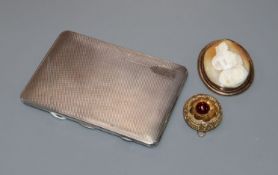 A silver presentation cigarette case (modified for use as a photograph frame), a gilt metal mourning