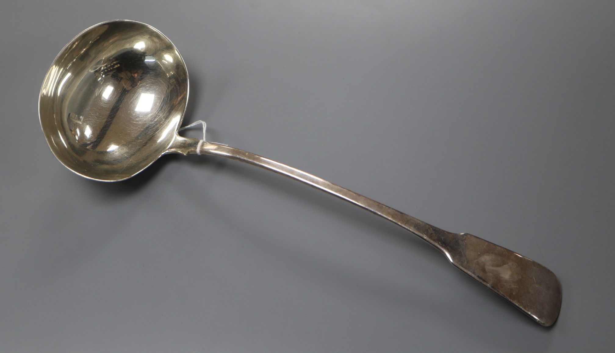 A George III silver fiddle pattern soup ladle, Turner & Shea, London, 1808, 6 oz, 32.5cm.