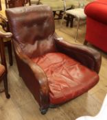 A late Victorian Howard style leather armchair, a.f.