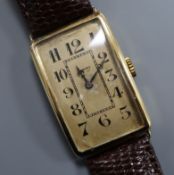 A gentleman's 1930's/1940's? yellow metal manual wind wrist watch, retailed by Asprey, (one lug a.