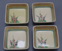 Four Clarice Cliff Hollyhock dishes length 11cm approx.