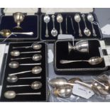 Two silver Christening sets, two sets of six silver coffee spoons (one with tongs), a napkin ring