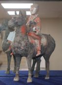 A Chinese painted pottery horse and rider, probably Han dynasty (206 BC - 220AD)