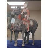 A Chinese painted pottery horse and rider, probably Han dynasty (206 BC - 220AD)