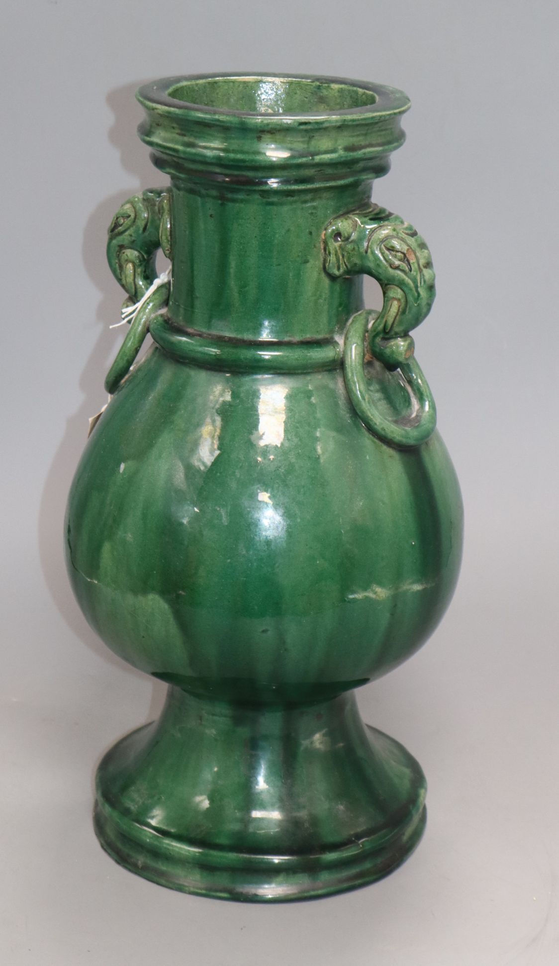 A Chinese green-glazed pottery vase, 18th/19th century height 37cm