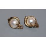 A pair of 9ct gold and mabe pearl set scrolling design earrings (no butterflies), 23mm.