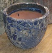 An 'Atlantis' blue glazed garden planter H.29cm