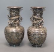 A pair of Japanese silver-plated bronze vases engraved and applied with dragons (one rim a.f.)