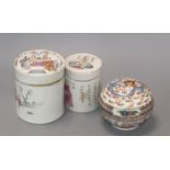 Two Chinese famille rose lidded pots and a circular pot