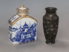 A Chinese blue and white tea caddy and a Japanese bronze vase