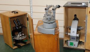 A Comparison microscope unit, no.128, cased, a Spencer Buffalo USA microscope microscope, no.148608,