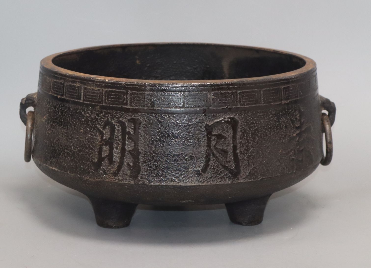 A Chinese cast iron tripod censer diameter 31cm