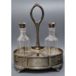 A Victorian silver oval cruet stand, Boardman & Glossup, Sheffield, 1875, with two associated silver
