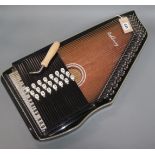 An Ashbury 21 Bar Deluxe Autoharp with tuning wrench