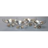 A set of four George III silver two handled boat shaped salts, William Abdy I, London, 1786, width