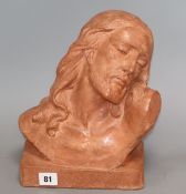 U. Cipriani. A terracotta bust of Christ, signed height 28cm