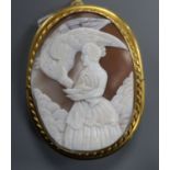 A gilt metal mounted oval cameo pendant brooch, carved with Diana & the Eagle, 65mm.