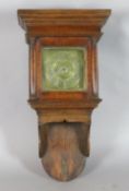 An early 19th century oak cased wall timepiece with alarum, with Roman chapter ring and single