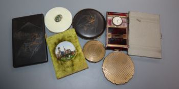 A small collection of assorted compacts including Japanese.