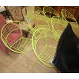 A set of seven green wirework tub chairs