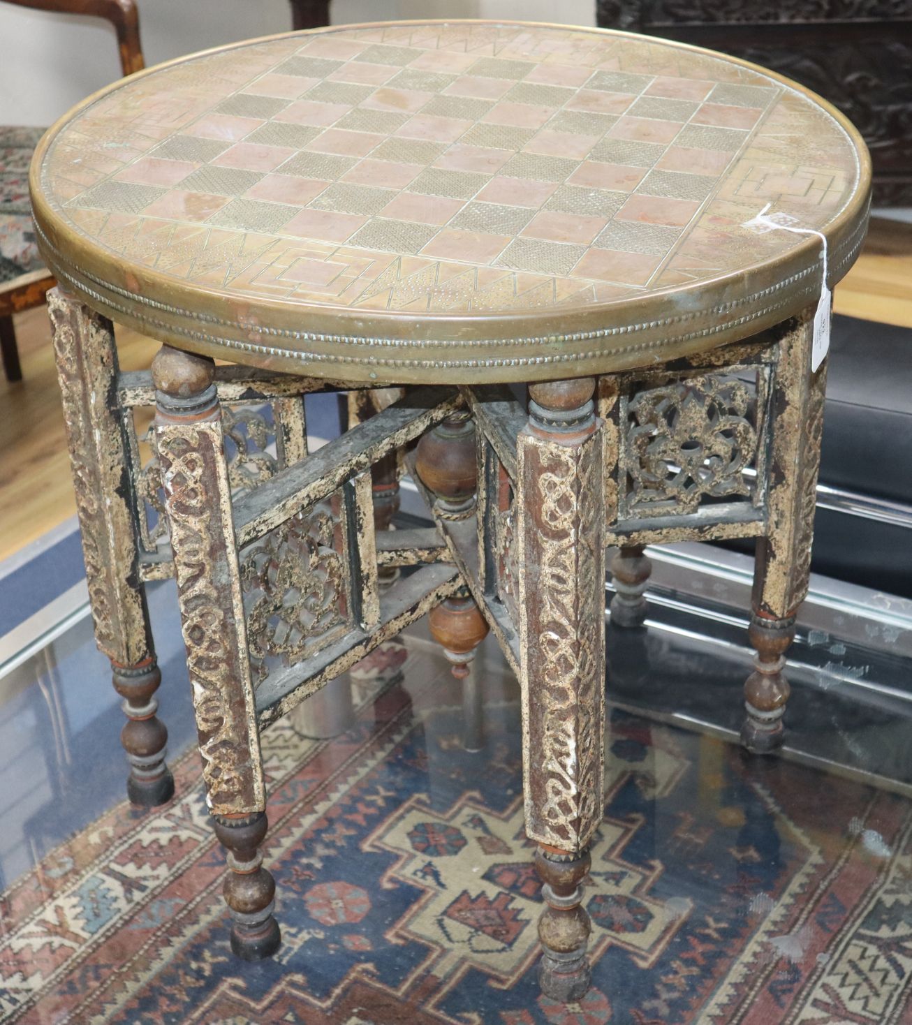 An Indian tray top table with 18th/19th century painted wood base, ex John Hilliard collection