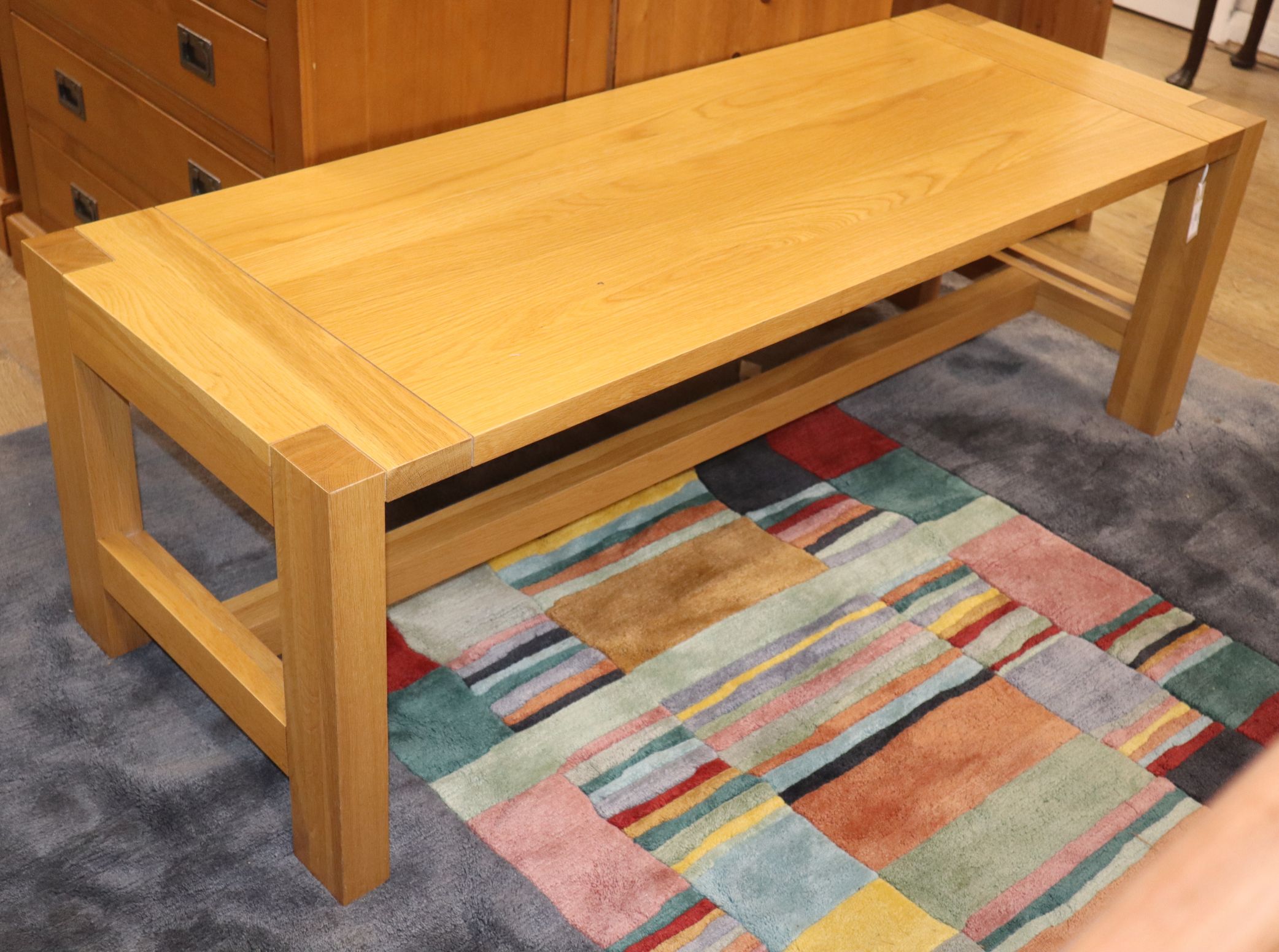 A light oak coffee table W.136cm