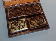 A lacquer box of Mother of Pearl gaming counters