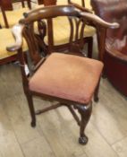 A George II mahogany corner elbow chair