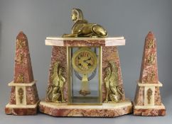 An early 20th century French ormolu and marble Egyptian revival clock garniture, with portico