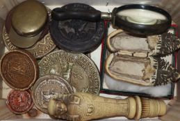 Assorted seals, a trench art cap, an eye glass etc