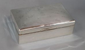 A George VI silver cigarette box, engraved with signatures, Mappin & Webb, London, 1940, 22.8cm.