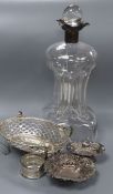 An Edwardian silver mounted waisted decanter, London, 1901, two small silver bonbon dishes, a