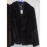 A dark brown mink evening jacket