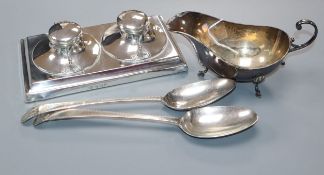 A George V silver double inkwell stand with pen rest, London 1912, a silver sauce boat and pair of