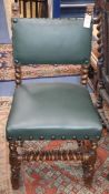 A matched set of ten 17th century style oak dining chairs with green leather upholstery