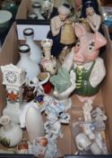 A collection of miniature ceramics, crested ware, a pig money box, pin boxes etc.