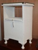 Two Lloyd loom style bedside cabinets W.40cm and 41cm