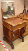 A Victorian walnut davenport, with later mirror back W.56cm